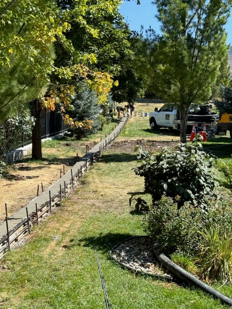 Long Curb Wall Installation in Richmond Utah image