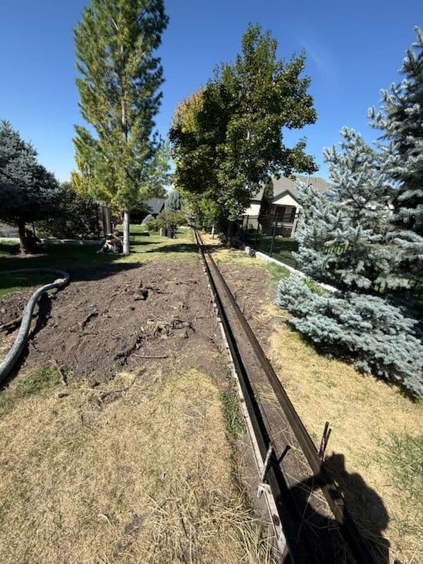 Gallery photos for Long Curb Wall Installation in Richmond Utah: Image #1